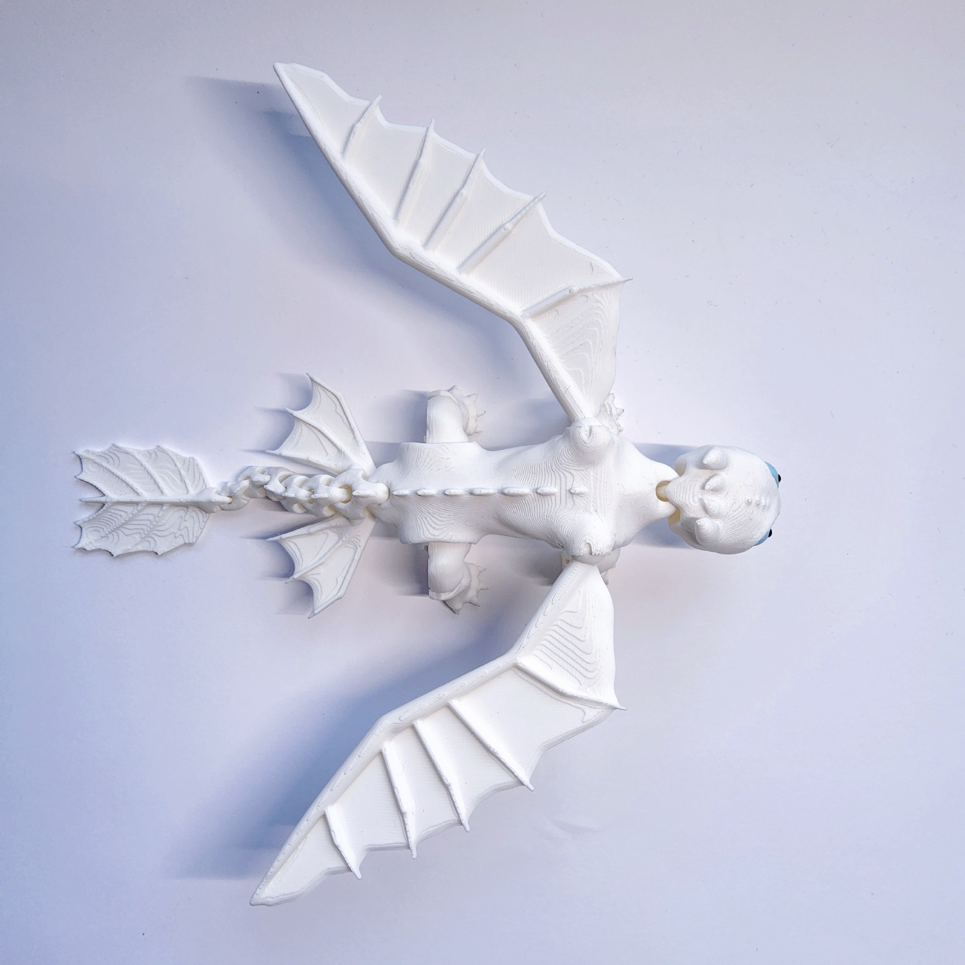 3D Printed Toothless Toy Doll: Articulated, Multi - colored Figurine Model