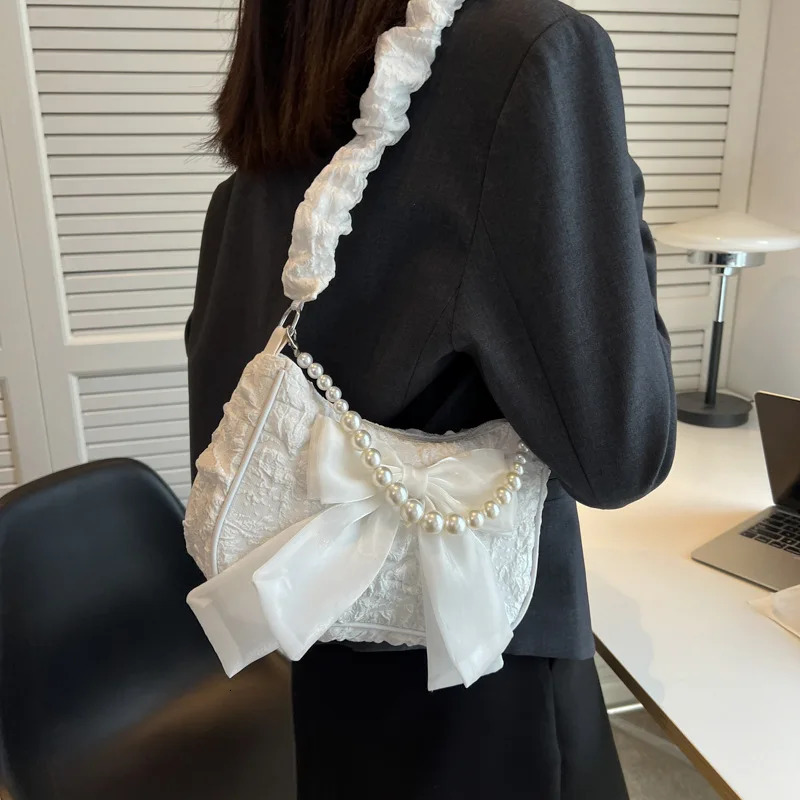 Texture lace pleated bag womens bag womens black pearl shoulder bag bow bracelet fashionable 250807