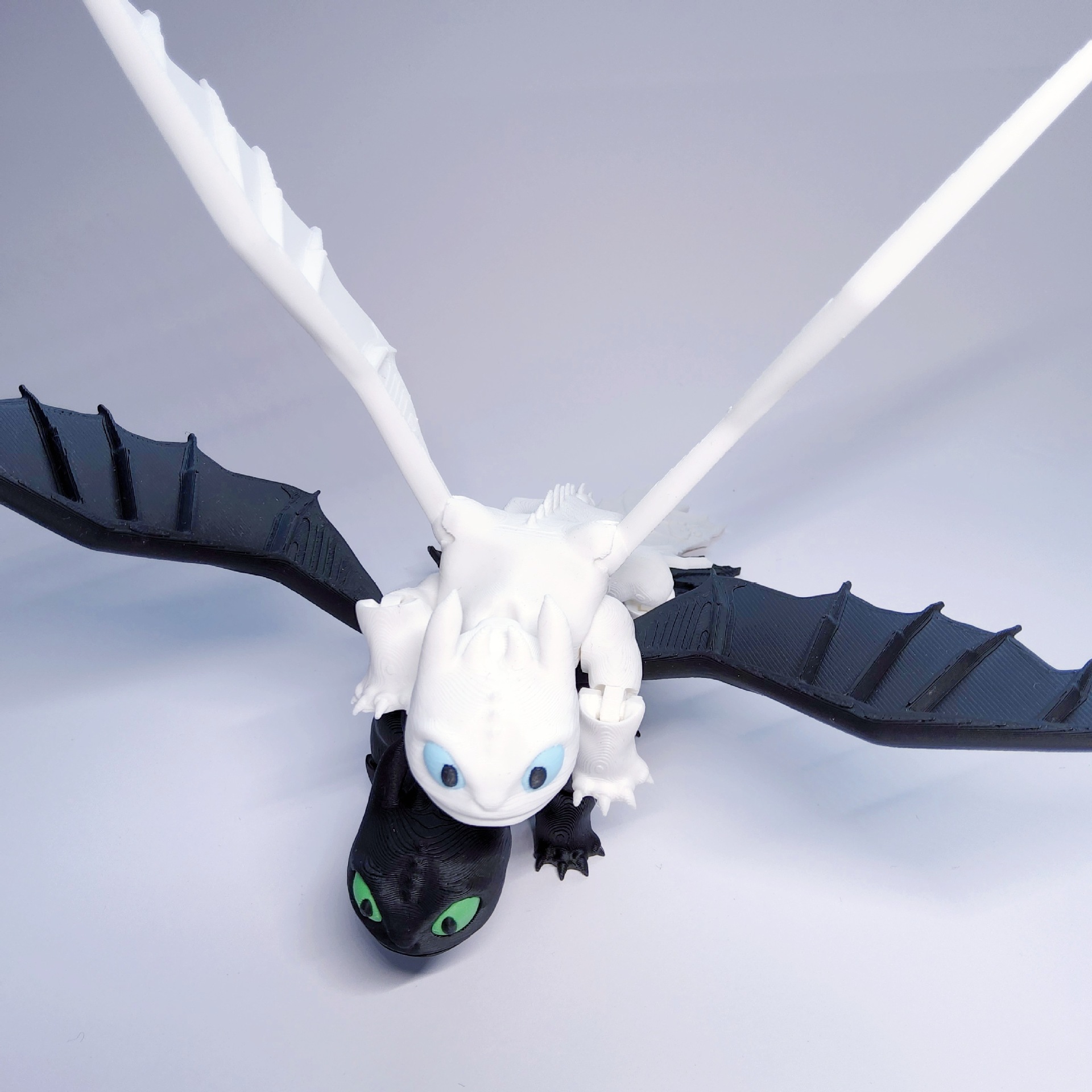 3D Printed Toothless Toy Doll: Articulated, Multi - colored Figurine Model
