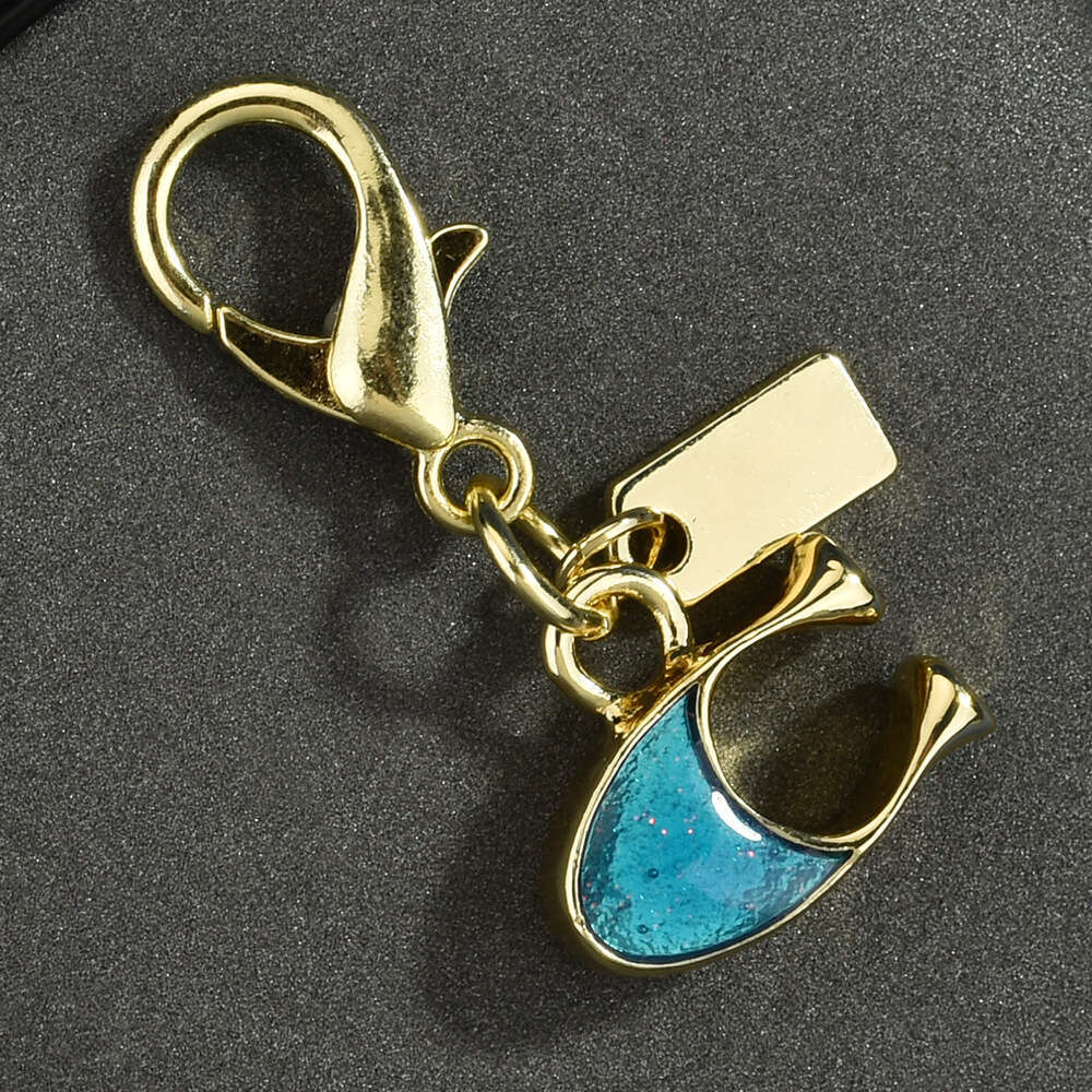 DHessentials Dinosaur Ice Cream Keychain - Cute Cartoon Bag Charm with Fruit Pendants, Trendy Metal Keyring for Kids & Teens (10cm, 7g)