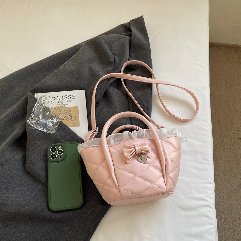 Free shipping designer French Niche Design Lace Trim Basket Shoulder Bag Crossbody Bag Elegant Versatile Quilted Embroidery Handbag