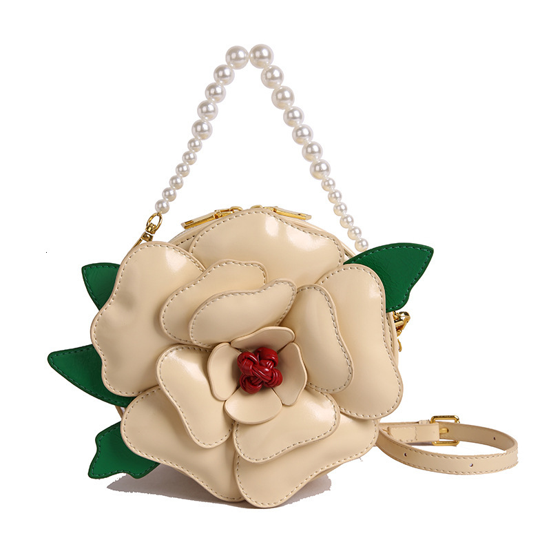 Free shipping designer Niche Design Floral Small Round Bag for Women Creative Light Luxury Shoulder Bag Crossbody Bag Socialite Pearl Handbag Evening 