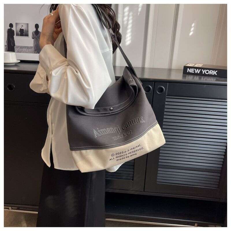 Canvas for Women with Large Capacity in 2024 New Texture Contrasting Color Summer Single Shoulder Crossbody Popular Commuting Tote Bag