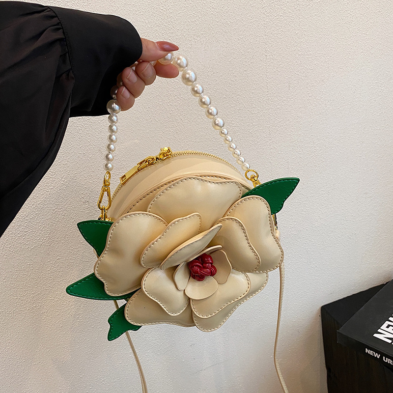Free shipping designer Niche Design Floral Small Round Bag for Women Creative Light Luxury Shoulder Bag Crossbody Bag Socialite Pearl Handbag Evening 