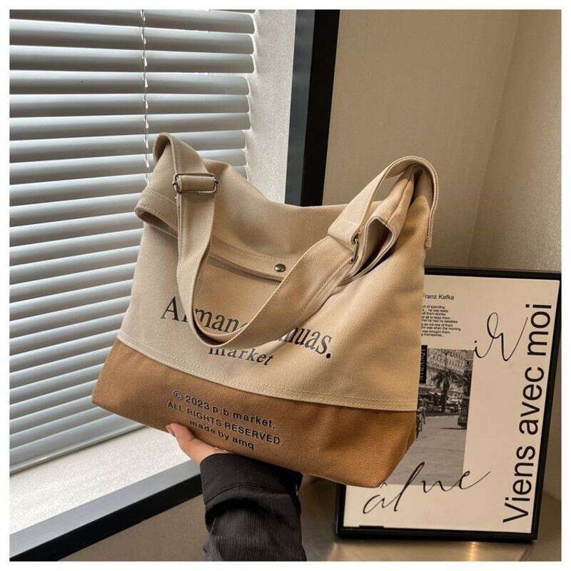 Canvas for Women with Large Capacity in 2024 New Texture Contrasting Color Summer Single Shoulder Crossbody Popular Commuting Tote Bag