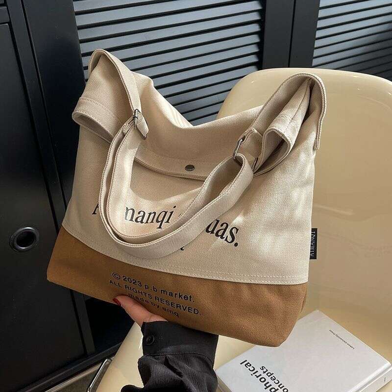 Canvas for Women with Large Capacity in 2024 New Texture Contrasting Color Summer Single Shoulder Crossbody Popular Commuting Tote Bag