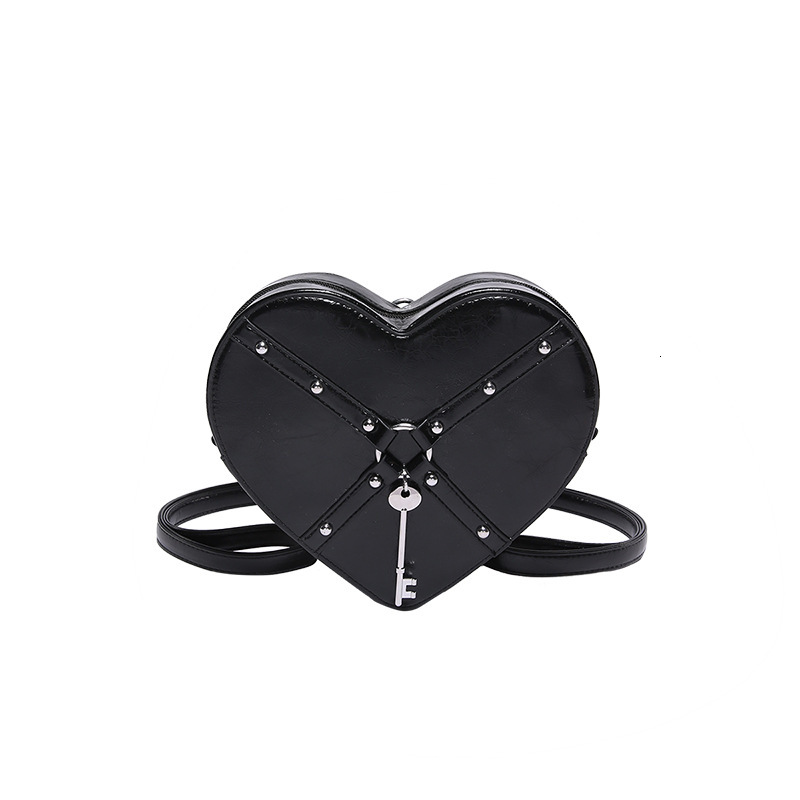 Free shipping designer Unique Hot Girl Heart Bag Women New Trend Rivet Motorcycle Style Shoulder Bag Crossbody Bag Personality Backpack