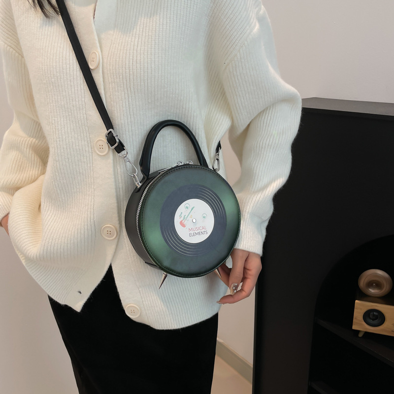 Free shipping designer Niche Design Bag for Women Ins Style Retro Record Shape Crossbody Bag Quirky Commuter Small Round Bag