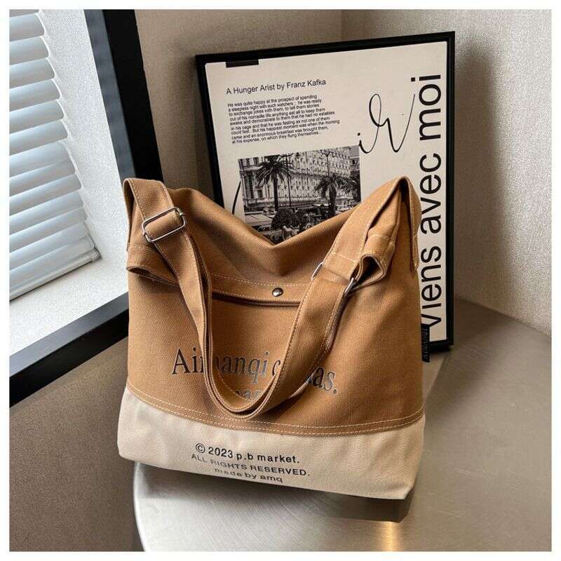 Canvas for Women with Large Capacity in 2024 New Texture Contrasting Color Summer Single Shoulder Crossbody Popular Commuting Tote Bag