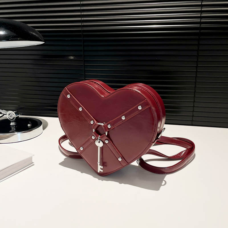 Free shipping designer Unique Hot Girl Heart Bag Women New Trend Rivet Motorcycle Style Shoulder Bag Crossbody Bag Personality Backpack