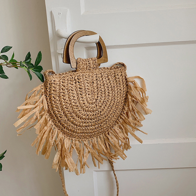 Free shipping designer Internet Celebrity Pastoral Style Straw Shoulder Bag Crossbody Bag for Women 2025 New Summer Woven Tassel Handbag Beach Bag