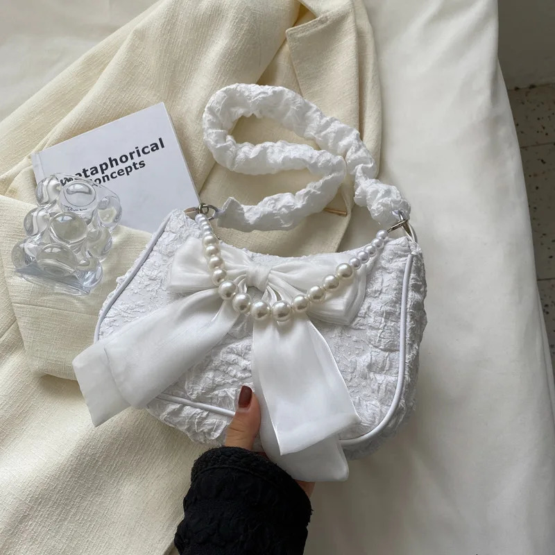 Texture lace pleated bag womens bag womens black pearl shoulder bag bow bracelet fashionable 250807