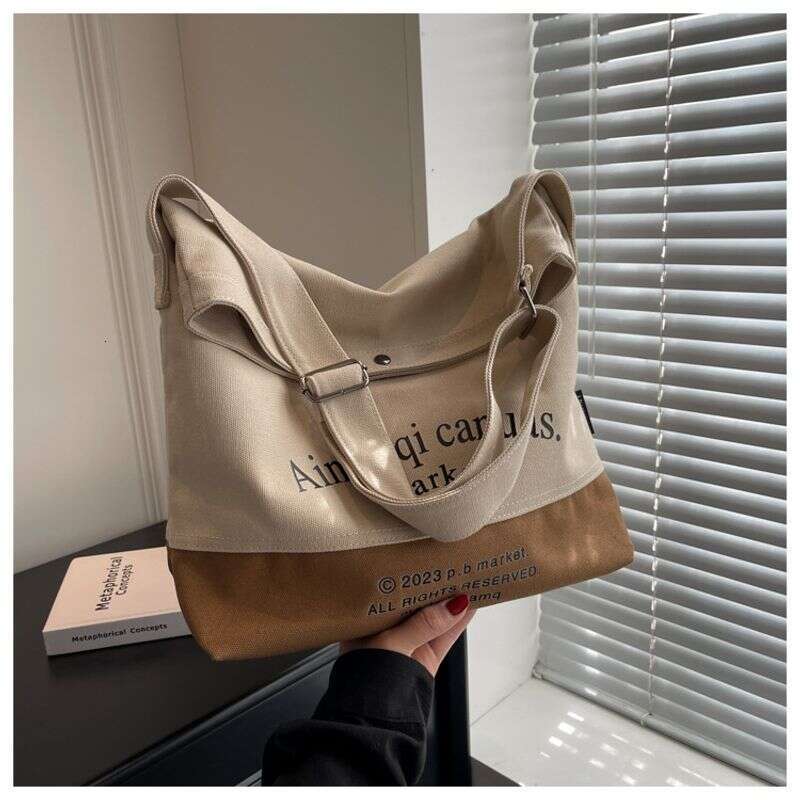 Canvas for Women with Large Capacity in 2024 New Texture Contrasting Color Summer Single Shoulder Crossbody Popular Commuting Tote Bag