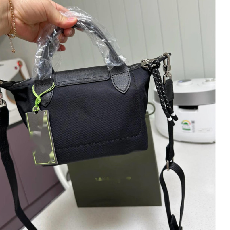 8a French Longchamp Mini Dumpling Commute Versatile Crossbody Handbag Womens Small Bag with Perforated Shoulder Strap Large Shopping Bag Portable Shopping Bag