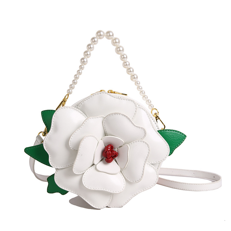 Free shipping designer Niche Design Floral Small Round Bag for Women Creative Light Luxury Shoulder Bag Crossbody Bag Socialite Pearl Handbag Evening 