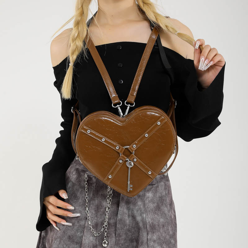 Free shipping designer Unique Hot Girl Heart Bag Women New Trend Rivet Motorcycle Style Shoulder Bag Crossbody Bag Personality Backpack