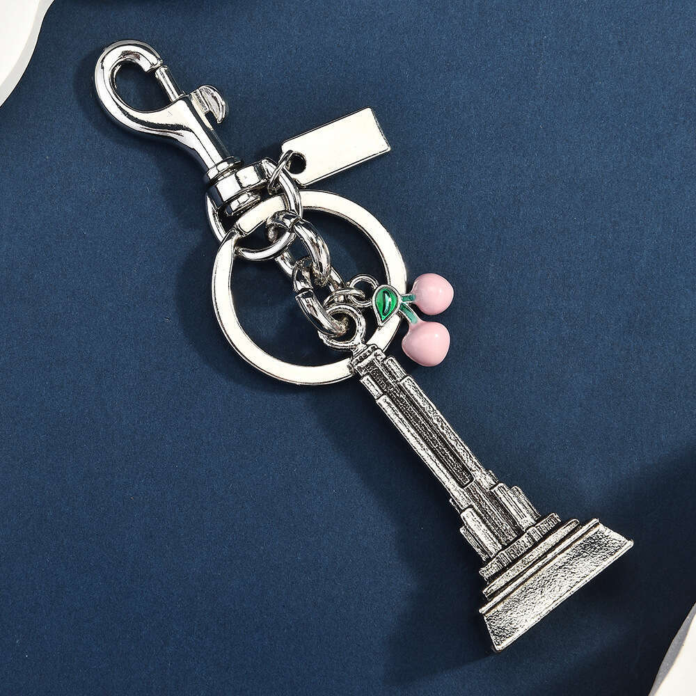 DHpet_wholesale Trendy Cherry & Eiffel Tower Keychain - Fashion Metal Bag Charm in Gold/Silver, Stylish Key Ring Accessory (10cm, 50g)