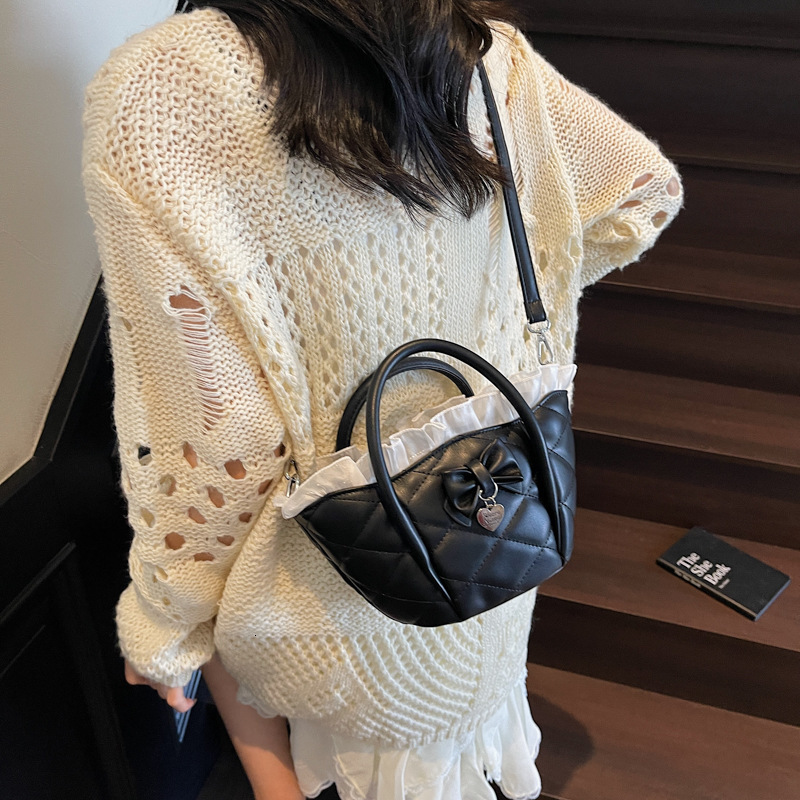 Free shipping designer French Niche Design Lace Trim Basket Shoulder Bag Crossbody Bag Elegant Versatile Quilted Embroidery Handbag