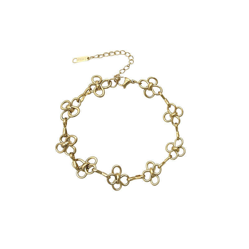 Luxury jewelry designer bracelet Cuban chain temperament hollowed out gold chain fashion personality titanium steel bracelet no fade versatile flower 