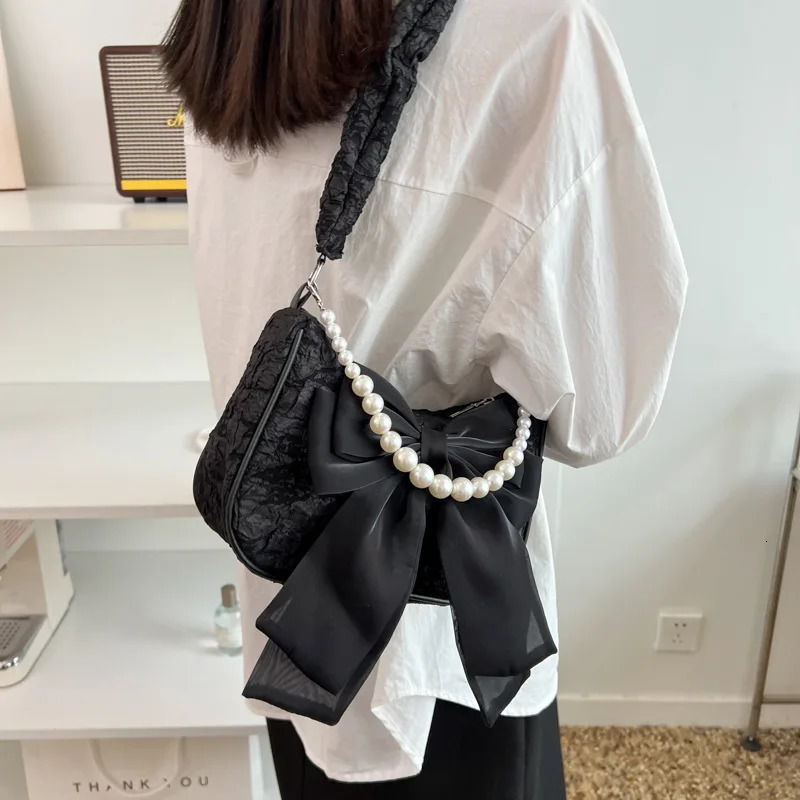 Texture lace pleated bag womens bag womens black pearl shoulder bag bow bracelet fashionable 250807