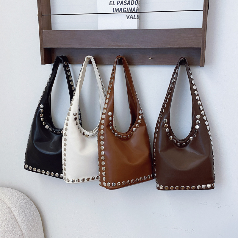 Free shipping designer Summer Versatile Large Capacity Casual Underarm Bag for Women 2025 New Hot Girl Motorcycle Style Rivet Bucket Bag