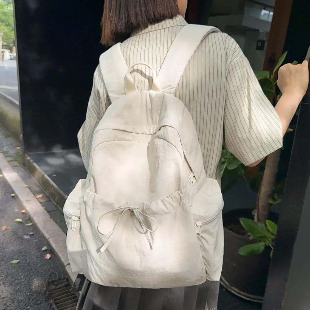 Student Backpack Womens Japanese Style Lightweight and Fashionable Backpack Solid Color Simple Bow Casual Travel Backpack 250807