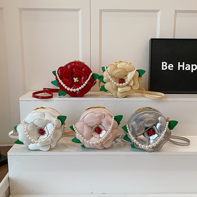 Free shipping designer Niche Design Floral Small Round Bag for Women Creative Light Luxury Shoulder Bag Crossbody Bag Socialite Pearl Handbag Evening 