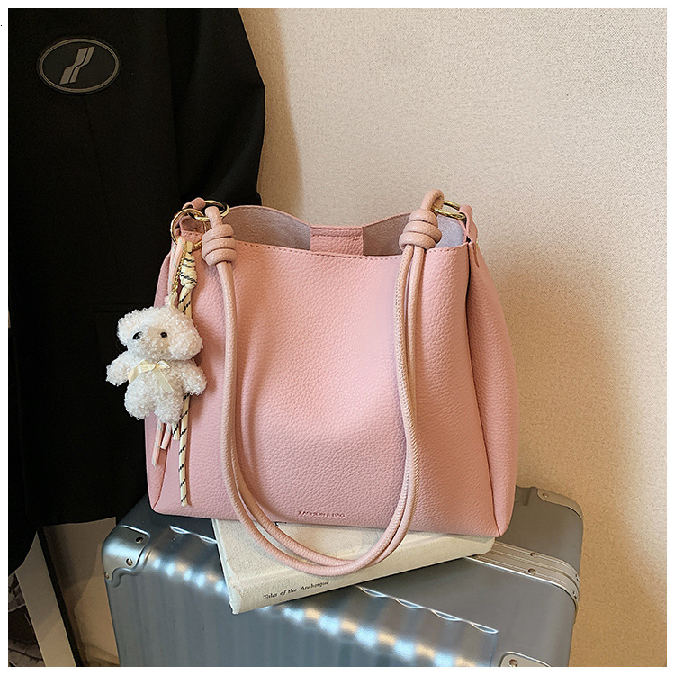2025 Autumn New Women s Shoulder Bag Large Capacity Women s fashion Fresh and niche Handbag Cute Pendant Autumn New Designer Bag New Women s Crossbody