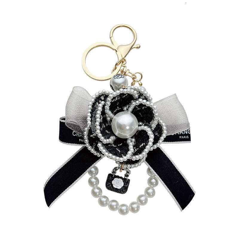 Creative Camellia Bow Bag Pendant Fashion Pearl Chain Korean Style Car Keychain Women's Ring