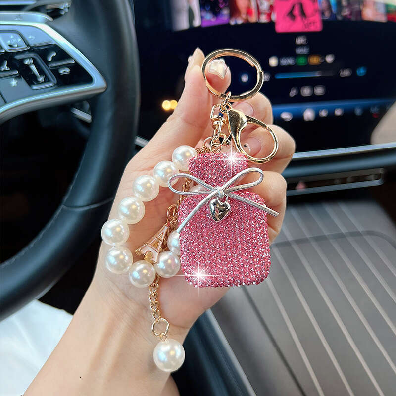 Korean Version New Inlaid Diamond Bow Keychain Imitation Pearl Gradient Color Perfume Bottle Bag Fashion Pendant