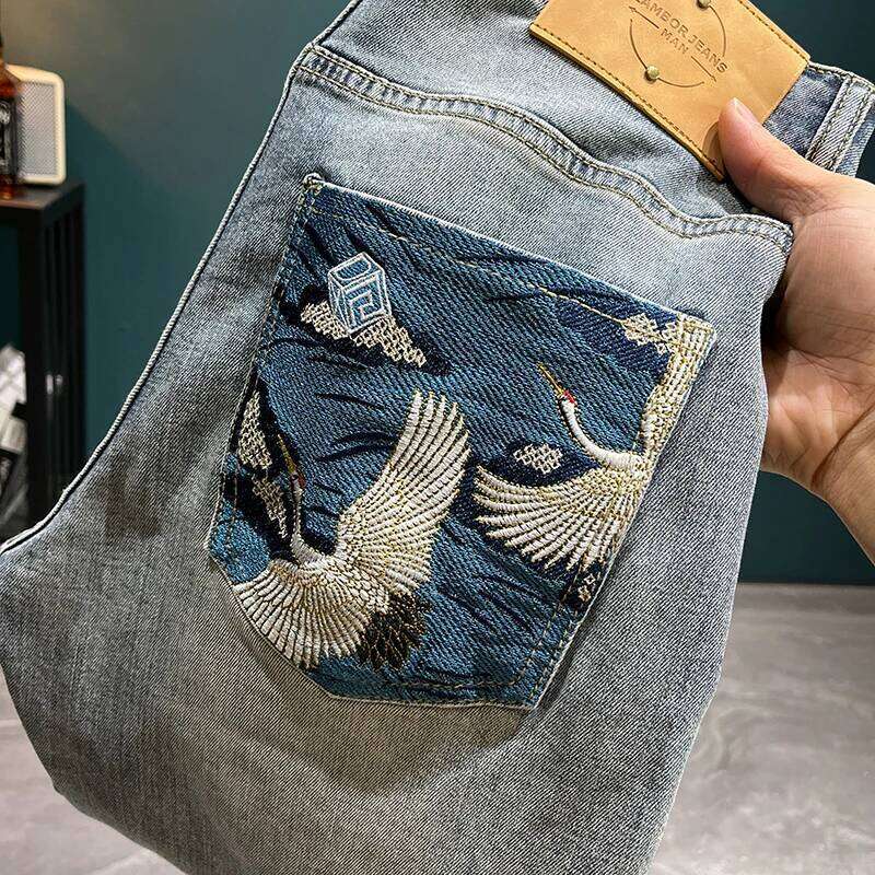 LB8518 Light trend embroidery jeans men's Slim small feet new tide elastic leisure hundred trousers