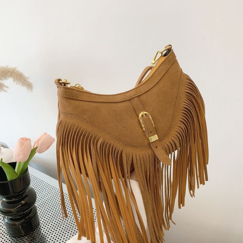 Casual Versatile Tassel Large Capacity Rivet Trendy Grassland Mongolian Denim Single Shoulder Crossbody Womens Bag240820