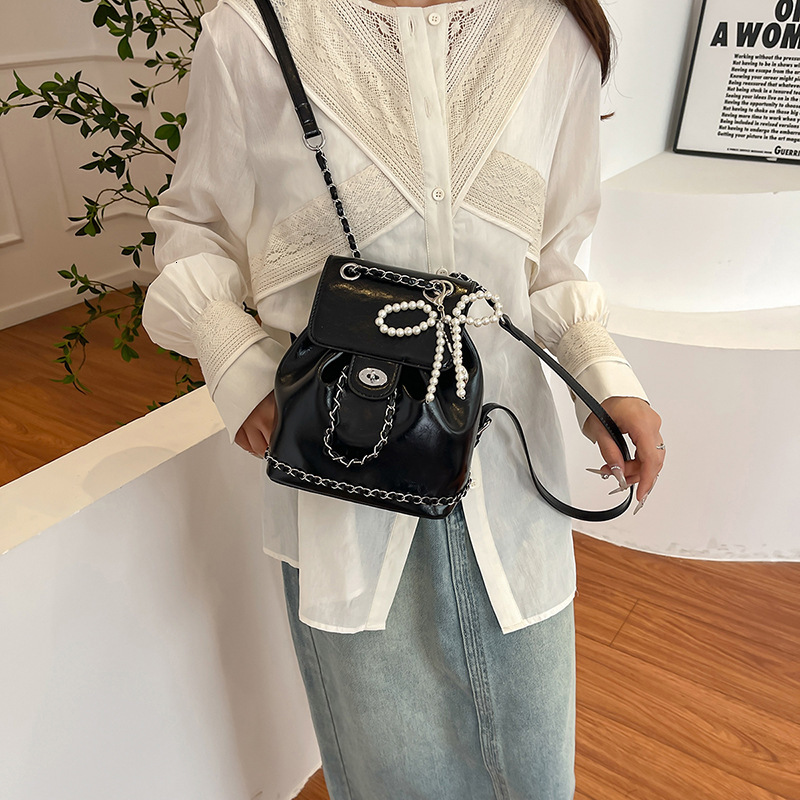 2025 Autumn New Women s trend Backpack Bow Silver PU Women s Backpack New Handbag Lock Design Chain Fashion Backpack New Designer Backpack