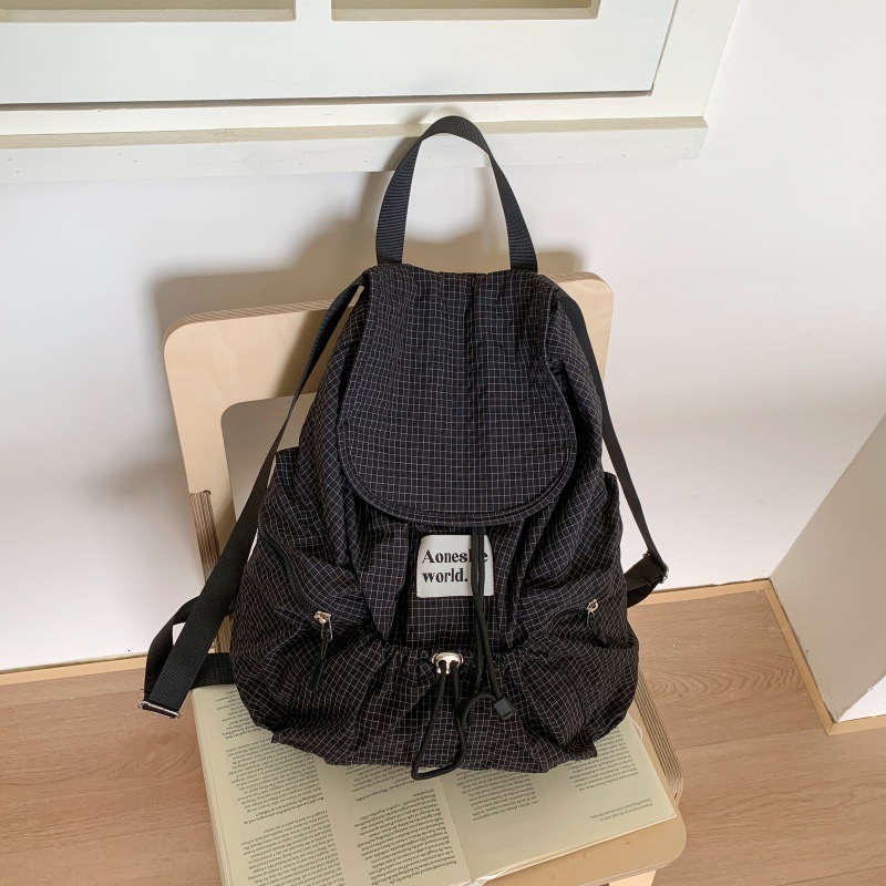 2025 Autumn fashion New Women s Backpack Simple Style Large Capacity Pulling Rope Women s Backpack Autumn Multi Pocket Grid New Designer Backpack
