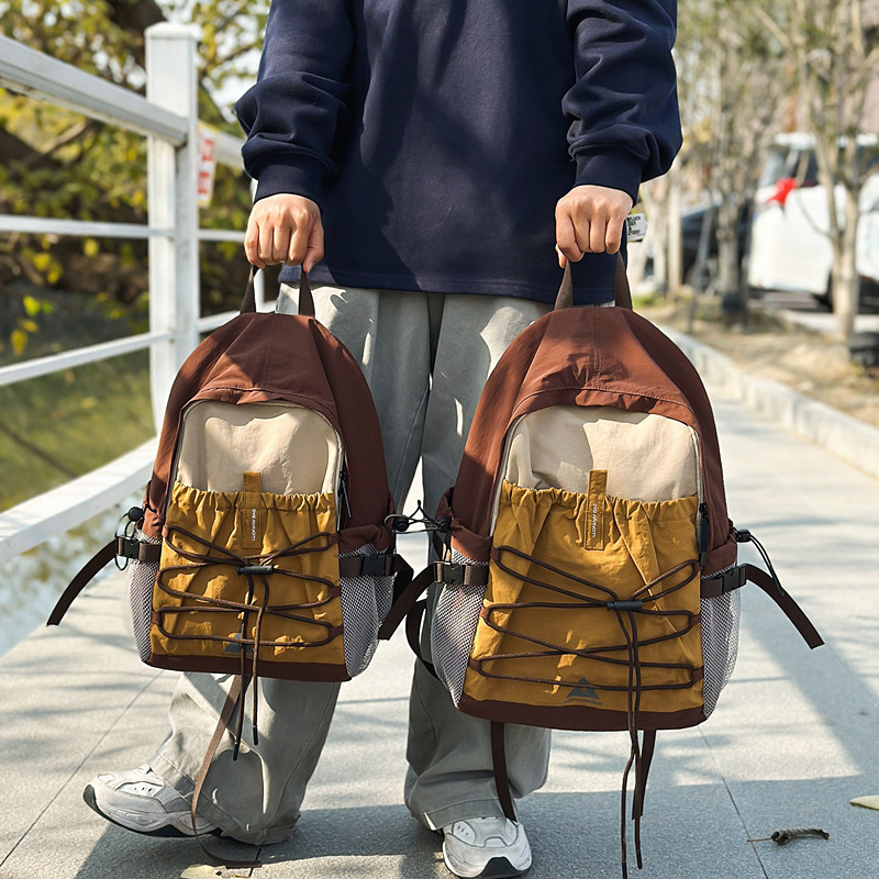 2025 Autumn New Neutral Style Backpack Lightweight Commuting fashion New College Student Large Capacity Outdoor Travel Leisure Backpack New Designer B