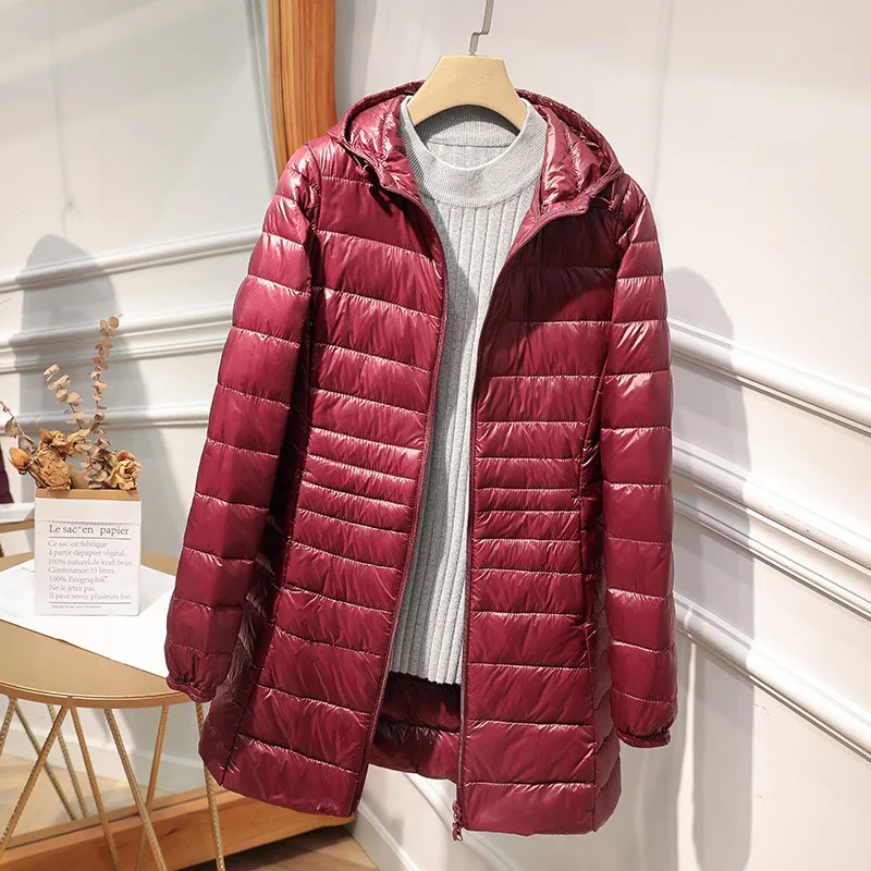 Female Long Warm Down Coat with Portable Storage Bag Women Light Down Jacket Ladies Overcoats Hip-Length High Street 250807