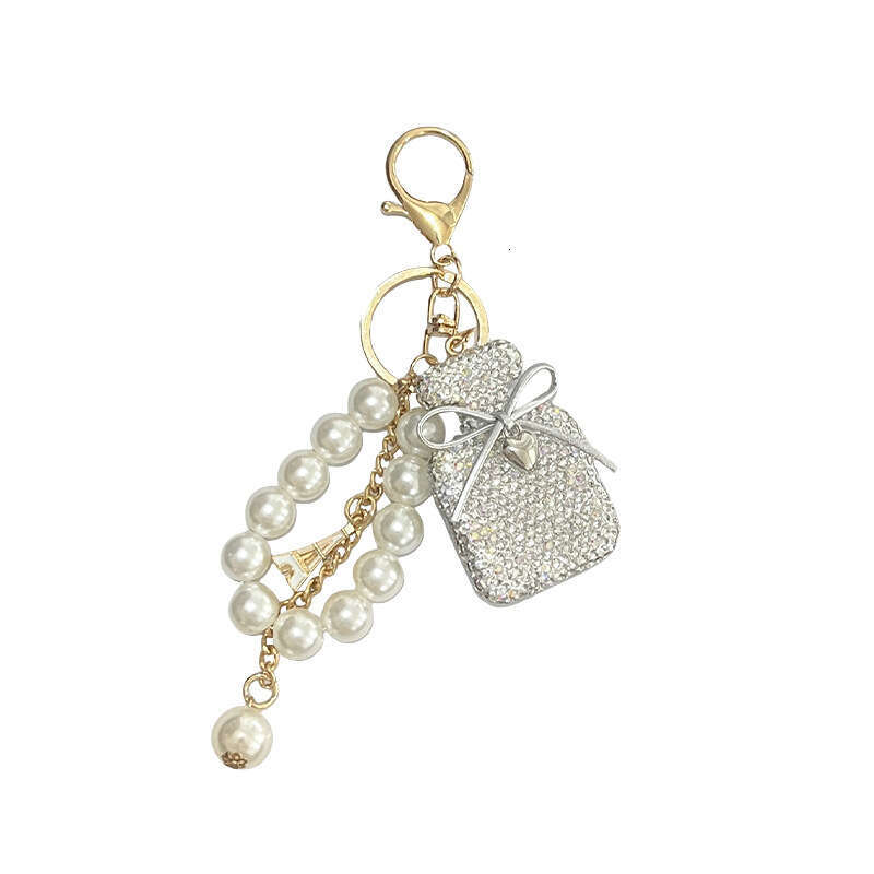 Korean Version New Inlaid Diamond Bow Keychain Imitation Pearl Gradient Color Perfume Bottle Bag Fashion Pendant