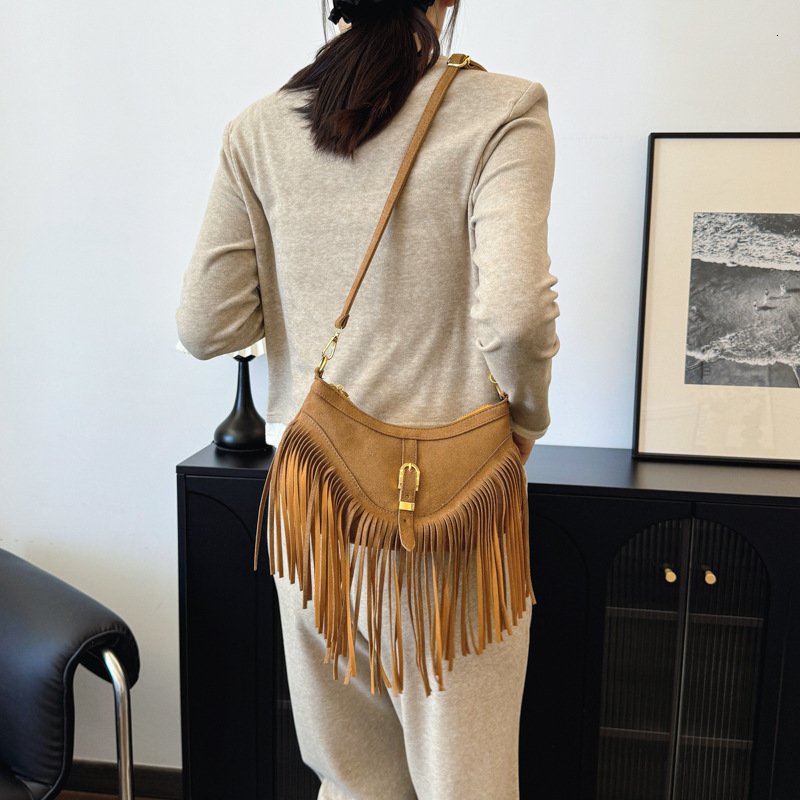 Casual Versatile Tassel Large Capacity Rivet Trendy Grassland Mongolian Denim Single Shoulder Crossbody Womens Bag240820