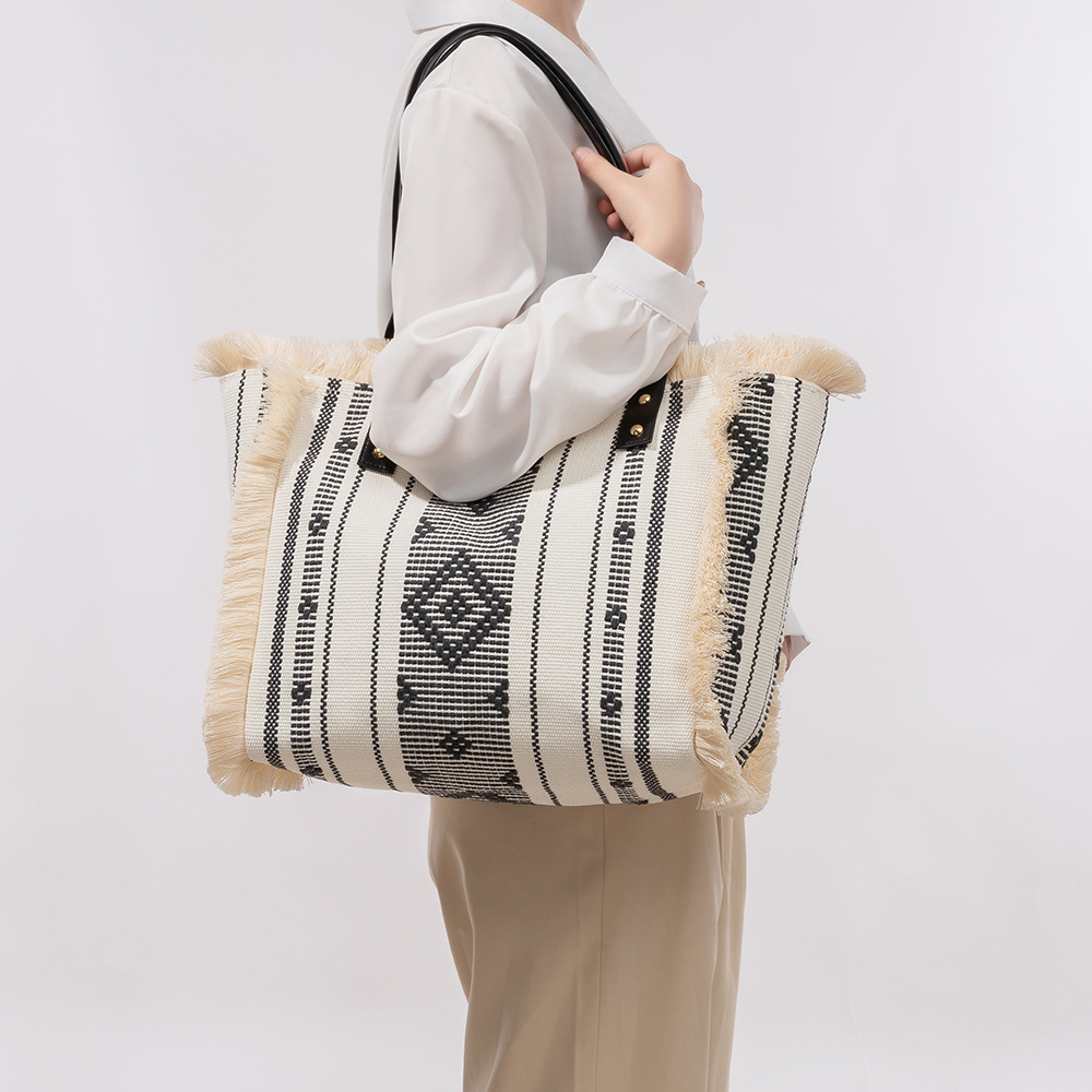 Free Shipping Designer Bag Canvas Bag Large Capacity Women's Tote Bag Four-sided Tassel Luxury Bag Handbag Niche Design Ethnic Style Shoulder Bag
