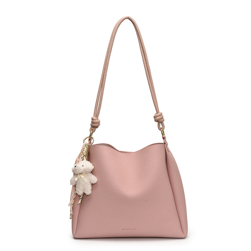 2025 Autumn New Women s Shoulder Bag Large Capacity Women s fashion Fresh and niche Handbag Cute Pendant Autumn New Designer Bag New Women s Crossbody