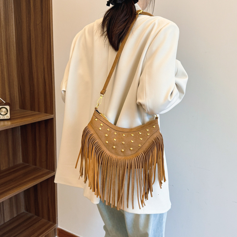 Casual Versatile Tassel Large Capacity Rivet Trendy Grassland Mongolian Denim Single Shoulder Crossbody Womens Bag240820