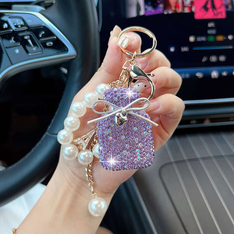Korean Version New Inlaid Diamond Bow Keychain Imitation Pearl Gradient Color Perfume Bottle Bag Fashion Pendant