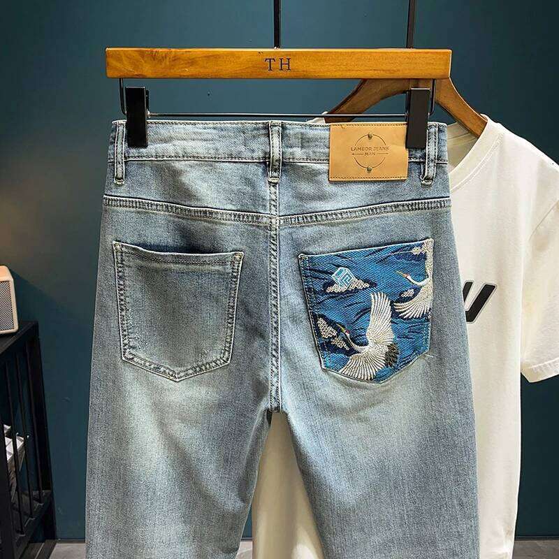 LB8518 Light trend embroidery jeans men's Slim small feet new tide elastic leisure hundred trousers