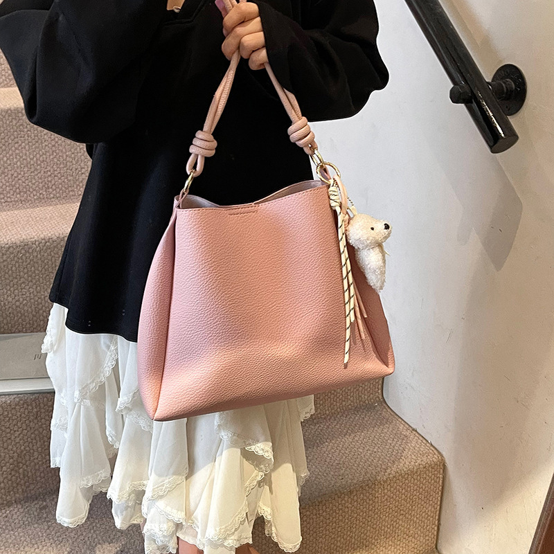 2025 Autumn New Women s Shoulder Bag Large Capacity Women s fashion Fresh and niche Handbag Cute Pendant Autumn New Designer Bag New Women s Crossbody