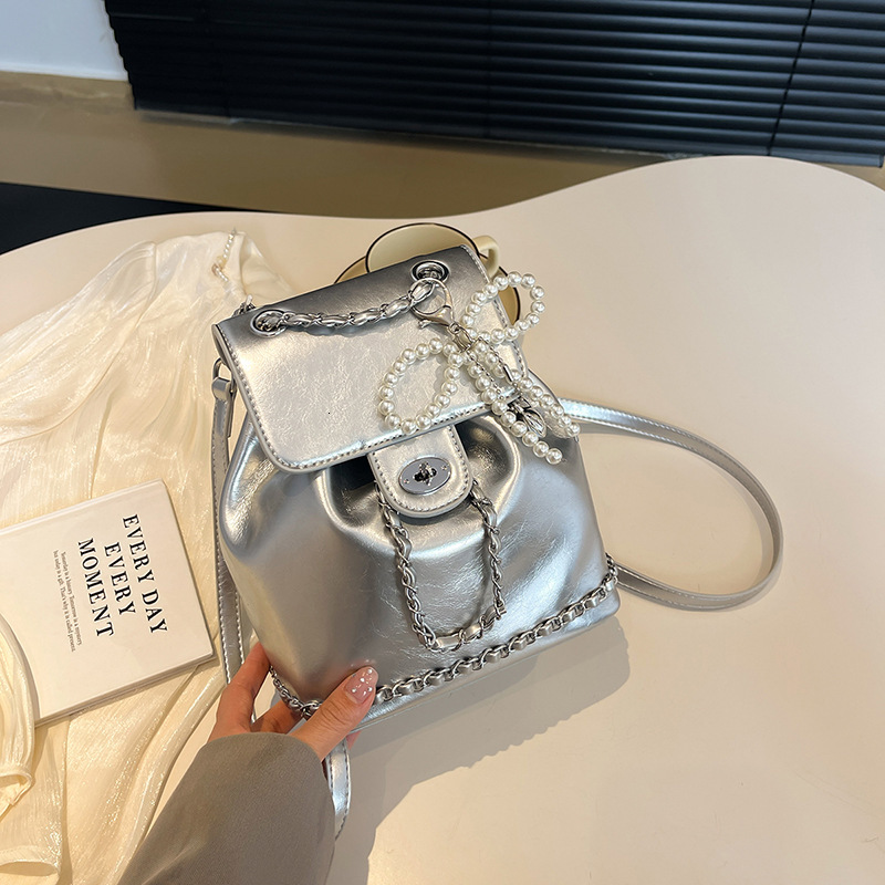 2025 Autumn New Women s trend Backpack Bow Silver PU Women s Backpack New Handbag Lock Design Chain Fashion Backpack New Designer Backpack