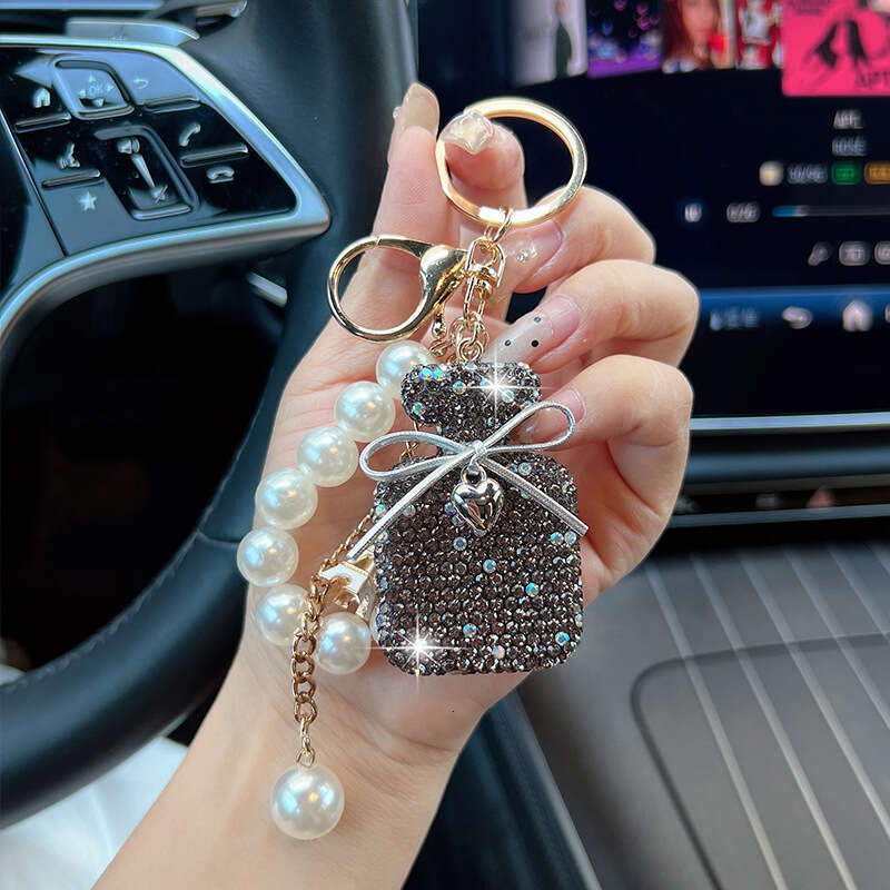 Korean Version New Inlaid Diamond Bow Keychain Imitation Pearl Gradient Color Perfume Bottle Bag Fashion Pendant