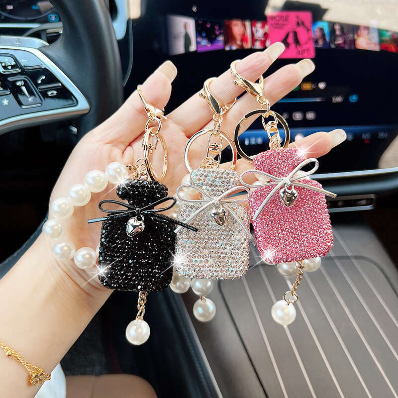 Korean Version New Inlaid Diamond Bow Keychain Imitation Pearl Gradient Color Perfume Bottle Bag Fashion Pendant