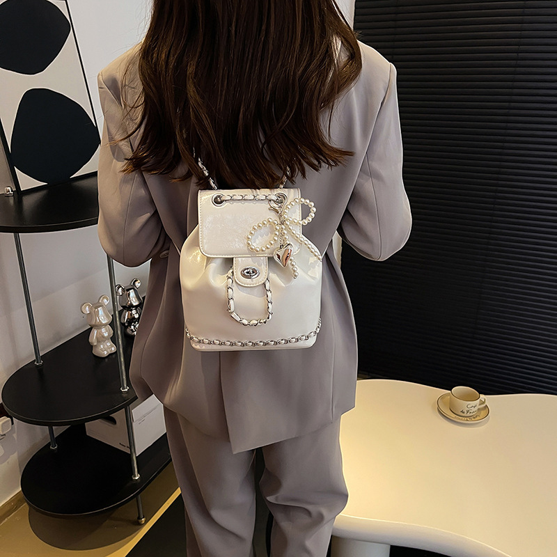 2025 Autumn New Women s trend Backpack Bow Silver PU Women s Backpack New Handbag Lock Design Chain Fashion Backpack New Designer Backpack