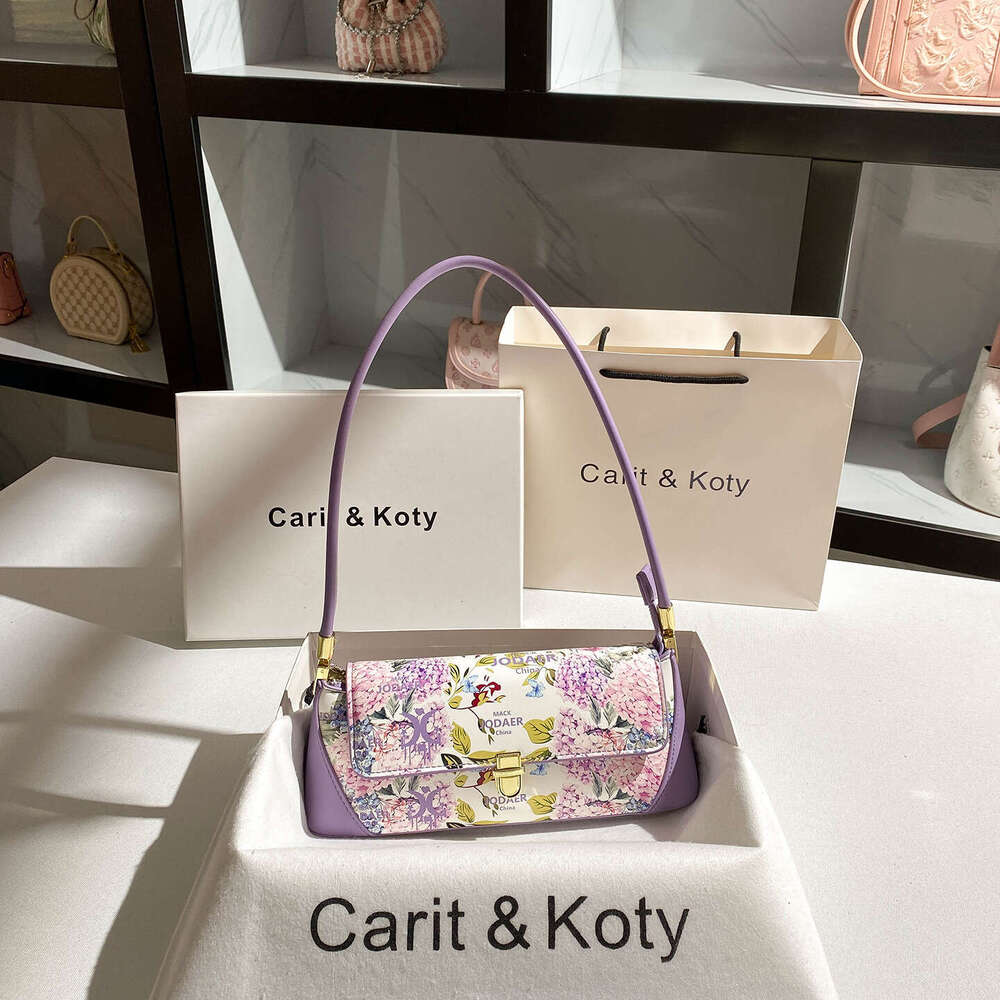 Niche New Printed Baguette New HighEnd Underarm Shoulder Bag