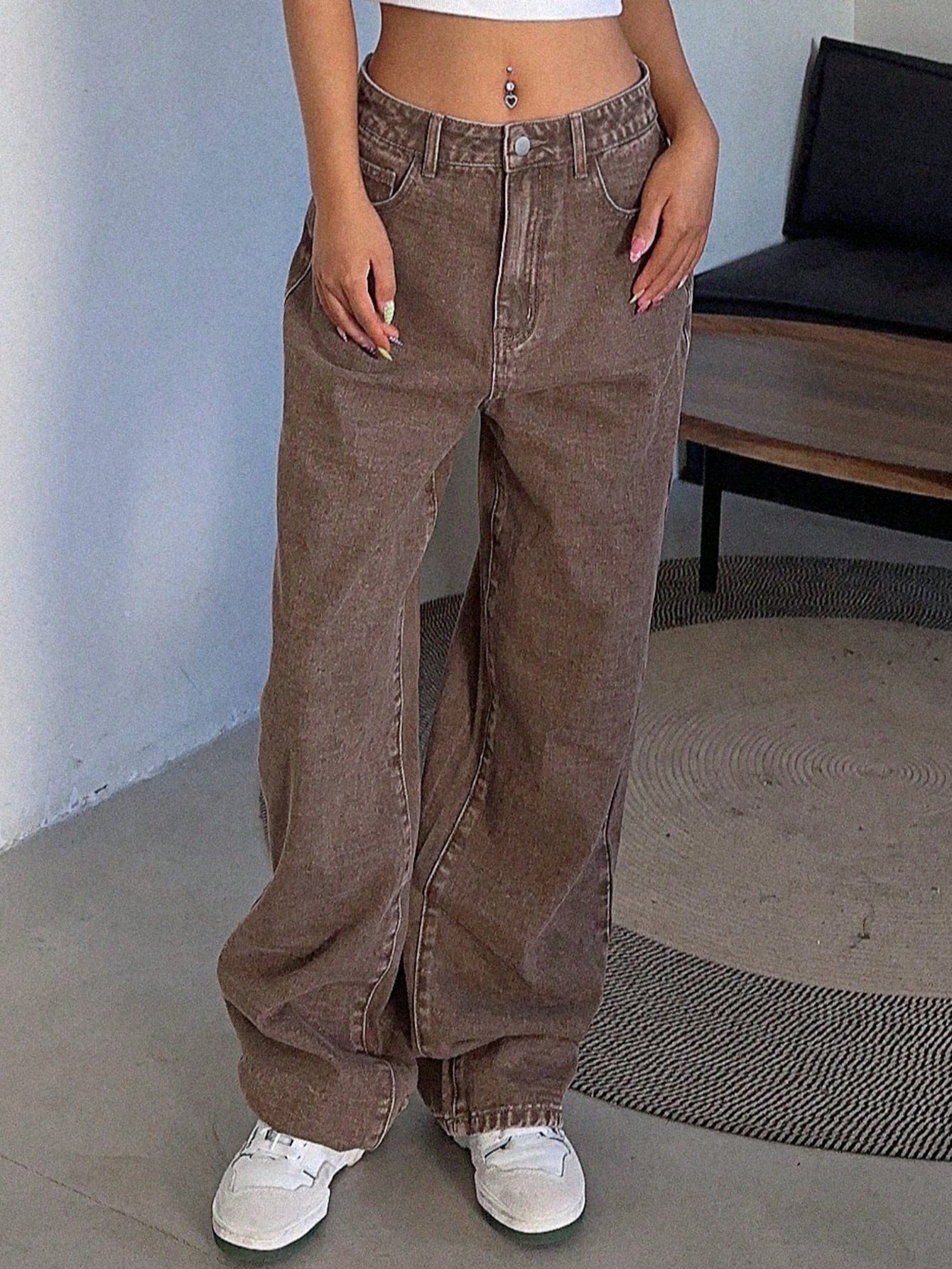 Lady's brown high-waisted wide-leg jeans